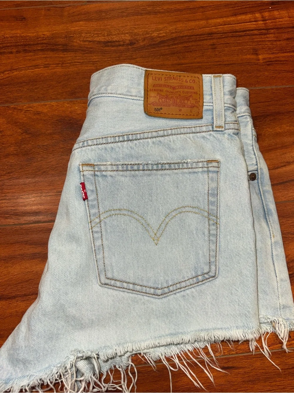 Levi's Light Blue Frayed Denim Cutoff Shorts